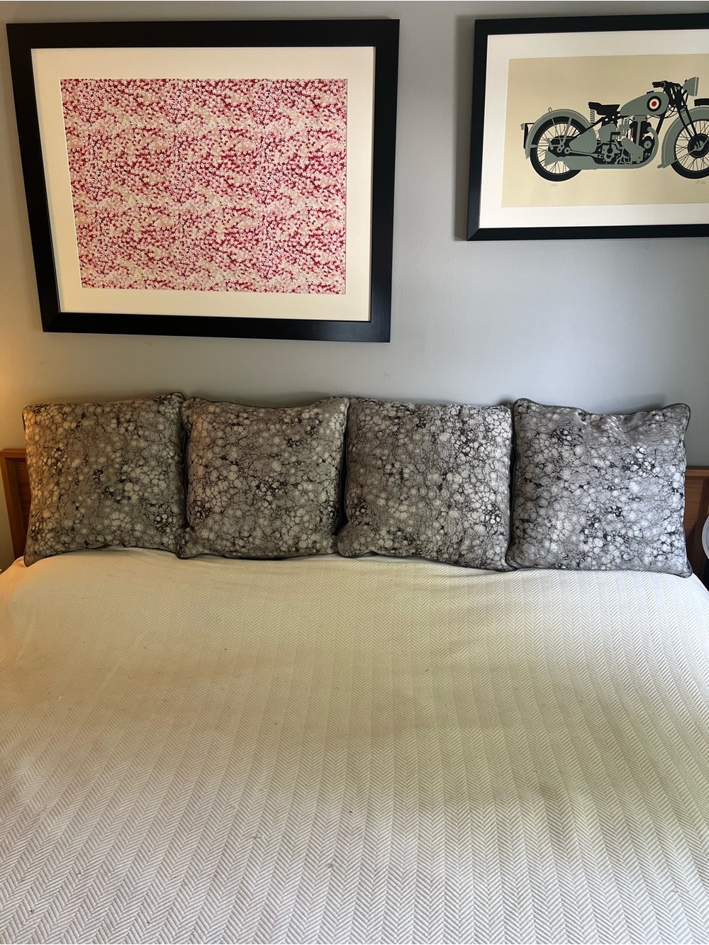 Marching set of four large decorative feather cushions in silver gray design
